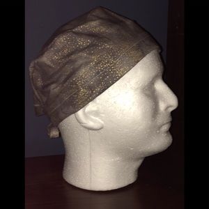Tie back style surgical cap